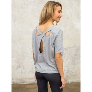 FOR FITNESS gray blouse with cutouts on the back kép