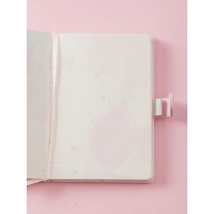 Notebook with a drawing print and clasp kép