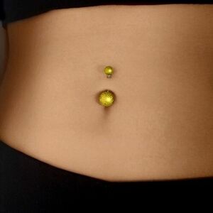 Akril piercing köldökbe, golyók szemcsés felülettel, arany színben kép