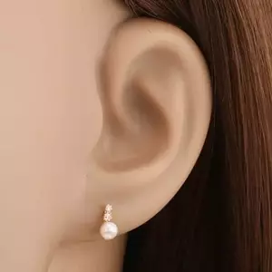 Fülbevaló 14K fehér aranyból – egy kerek átlátszó színű cirkónia, beszúrós fülbevaló kép