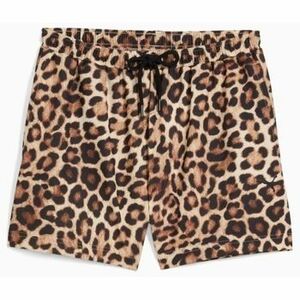 Nadrágok Puma LEO LUXE A-LINE AOP SHORTS kép