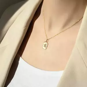 Arany medál 585 - kidomborodó angyal tábla téglalap keretben kép