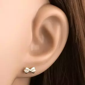 14 karátos arany fülbevaló masni alakú, átlátszó cirkóniákkal kép