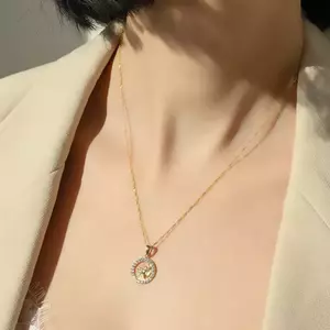 585 arany medál - fényes angyal szívvel, cirkóniás körvonal kép