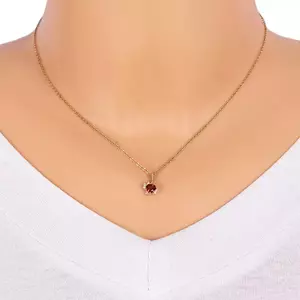 Medál sárga 9K aranyból - háromszög alakú gránáttal, tiszta cirkóniával kép