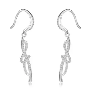 925 ezüst fülbevaló - összefonódó vállak, átlátszó cirkóniák, afrikai aksztó kép