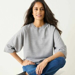 Laza pulóver könyökig érő ujjakkal kép