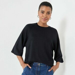 Laza pulóver könyökig érő ujjakkal kép