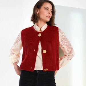 Arany gombokkal díszített mellény kép