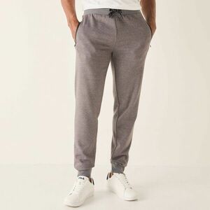 Sportos nadrág szűkülő végekkel és kontrasztos részletekkel kép