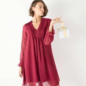 Bő, egyszínű, rövid ruha rakásokkal és pöttyökkel kép