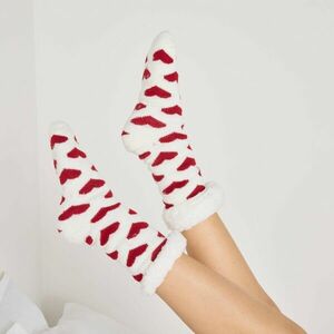 Meleg bélésű és szívmotívumos zoknik kép