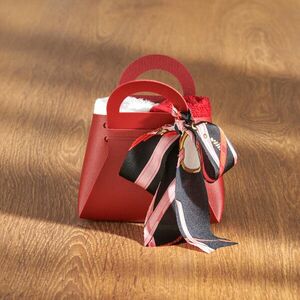 Ajándéktáska vendégtörülközőkkel 4 db. kép