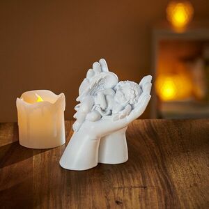 Angyal a tenyéren kép