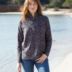 Póló cipzáras állógallérral és nyomtatással kép