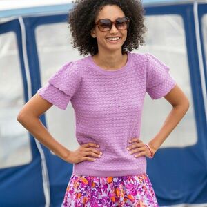 Rövid ujjú póló kötött anyagból, mintás mintával kép